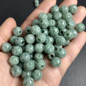 20 pcs / 50 pcs 6 - 13 mm high quality natural Burmese jadeite flower pattern round shape bead