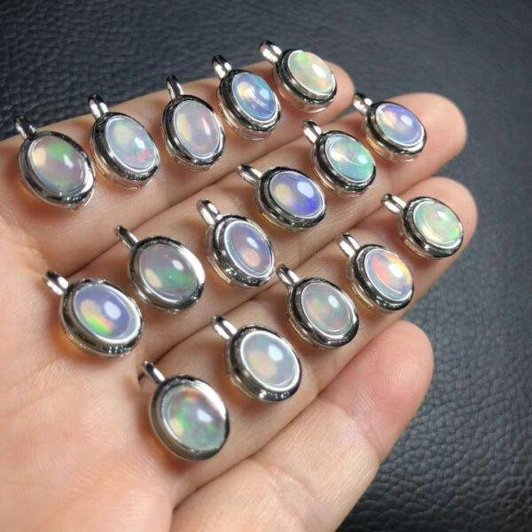 nice oval shape natural opal bead inlaid sterling silver charm
