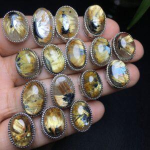 oval shape natural Rutilated Quartz bead inlaid sterling silver crown charm