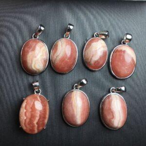 oval shape natural rhodochrosite bead inlaid sterling silver charm