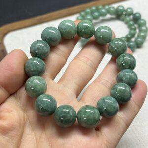 8mm - 13mm round shape natural oily green jadeite beaded bracelet