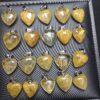 heart shape golden rutilated quartz charm pendant