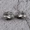 abstract Roc bird shape oxidized sterling silver bead