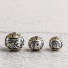 The six-character Buddhist mantra round oxidized sterling silver bead
