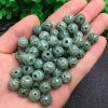 AAA Oily Green Natural Jadeite Hollow Lu‑Lu‑Tong Round Shape Bead